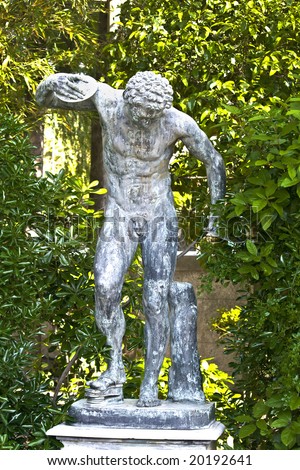 Ancient greek statue showing a disk thrower olympic athlete at Mon Repo palace in Corfu, Greece