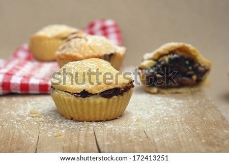Mini pie filled with plum, apple, dried plum and apricot and candied fruit filling