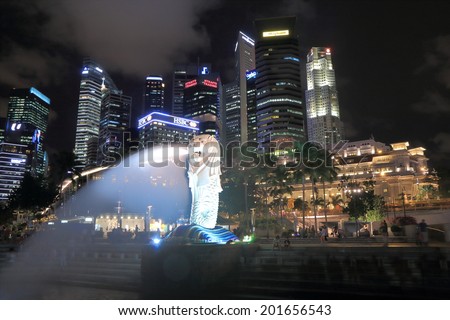 SINGAPORE - 27 May, 2014: Singapore Skyline and Merlion. Merlion is a symbol of Singapore with the head of a lion and the body of fish.