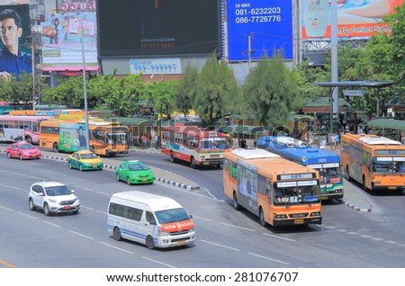 BANGKOK THAILAND - APRIL 19, 2015: Buses at Victory monument bus stop. Bangkok is famous for its heavy traffic congestion.