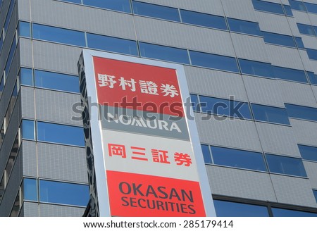 TOKYO JAPAN - MAY 8, 2015: Nomura and Okasan Securities. Nomura and Okasan Securities are one of the biggest security companies in Japan.