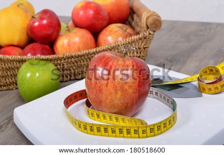 Apple placed on a scales and meter Photo stock © 