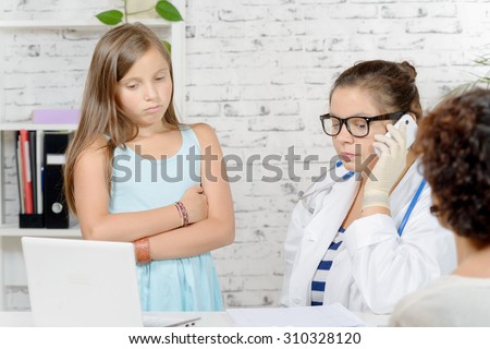 a little girl and her mother to the doctor, doctor phone