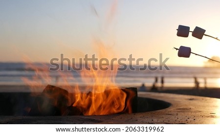 Similar – Foto Bild Feuer am Strand Insel