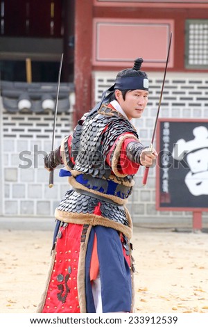SUWON, SOUTH KOREA - October 30, 2014 : Korean soldier with traditional Joseon dynasty during show martail arts at Hwaseong haenggung square. Photo taken on October 30, 2014 in Suwon, South Korea
