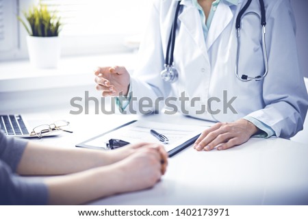 Similar – Image, Stock Photo doctor woman indoors, using mobile phone. Wearing protective gloves, mask and stethoscope. coronavirus covid-19 concept