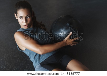 Similar – Image, Stock Photo Strong woman with med ball