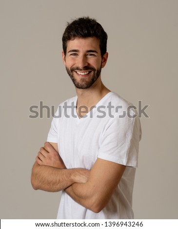 Similar – Image, Stock Photo Young man with dark hair standing in front of a wooden wall with sunlight patterns on his face