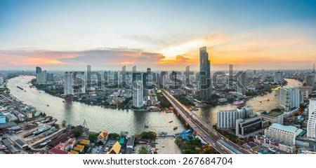 Bangkok, Thailand - April 5, 2015: Bird eye view of Bangkok city along the river during sunset