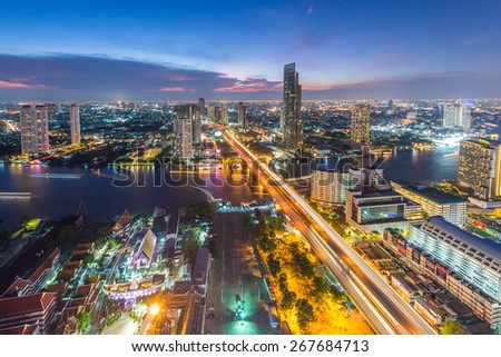 Bangkok, Thailand - April 5, 2015: Bird eye view of Bangkok city along the river during sunset
