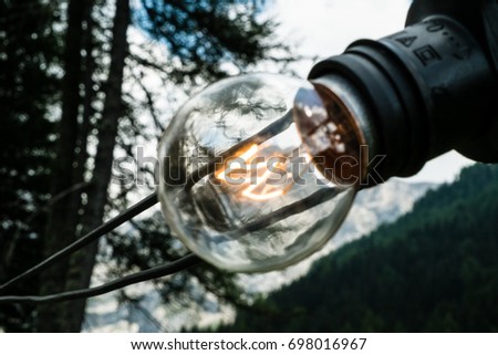 VAL SAN NICOLO', ITALY - August, 2017. Light bulb at Festa Ta Mont, traditional Ladino festival Stock fotó © 