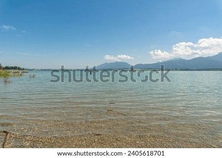 Similar – Image, Stock Photo Paddling on the Chiemsee