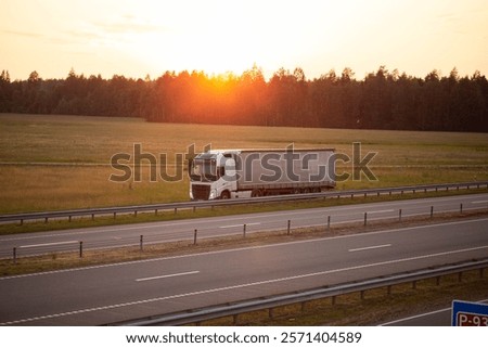 Image, Stock Photo a modern grey truck driving on an highway