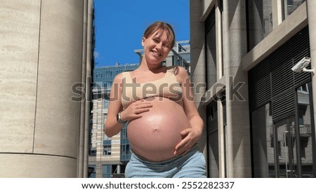 Similar – Image, Stock Photo Urban young pregnant woman