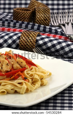 Gourmet exquisite halibut  fettuccine pasta  on fancy dinner plate