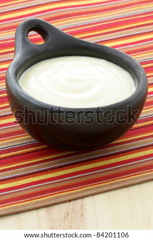 fresh delicious sour cream a traditional ingredient in France,Russia, Eastern European, German cooking and mexica cuisine.