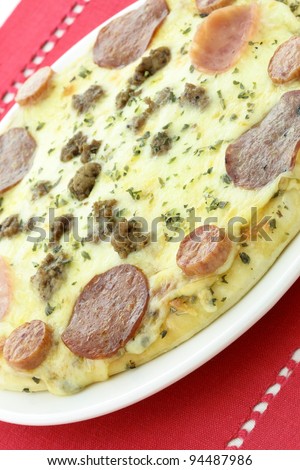 hot ready to eat delicious rustic meat lovers pizza
