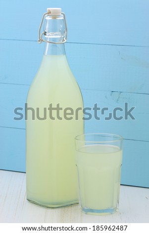 delicious and nutritious, organic lemonade on vintage bottle and glass