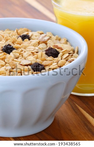 Delicious and nutritious lightly toasted breakfast muesli or granola cereal on vintage styling.