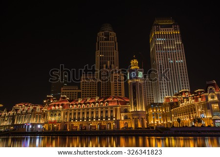 Tianjin - October 11 : Night scene cityscape of JInwan Plaza, popular night scene landmark of Tianjin city China on October 11,2015.