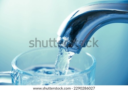 Similar – Image, Stock Photo white bubbling water fountain in front of blue sky