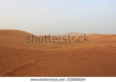 Sand moving in desert of UAE in safari tour
