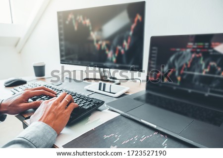 Business man deal Investment stock market discussing graph stock market trading Stock traders concept.