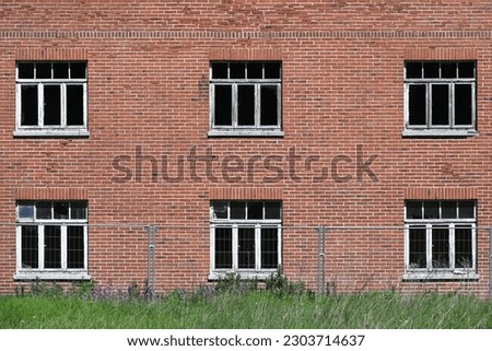 Similar – Image, Stock Photo Vacant house , lowered shutter with a sticker and the request to occupy the house.