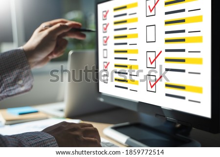 businessman SURVEY and Results Analysis Discovery pollConcept online test assess survey evaluate on computer  digital Assessment analysis Business