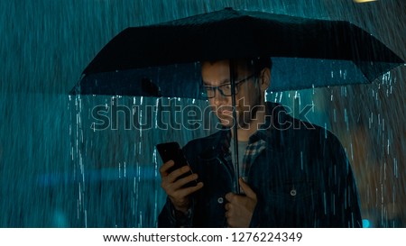 Similar – Image, Stock Photo It’s dark outside and the chandelier is lit up. Spooky trees and smokes are all around. A gorgeous brunette model is dressed in a white dress and white gloves. She’s looking bored and waiting for someone on a swing.