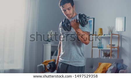Similar – Image, Stock Photo Young man lifts his bike