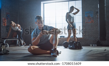 Similar – Image, Stock Photo Man browsing smartphone in office