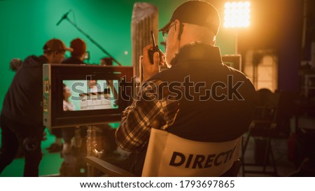 Director Gives Commands Shooting History Movie Green Screen CGI Scene with Actors Wearing Renaissance Costumes. Big Film Studio Professional Crew Shooting Big Budget Movie. Back View Shot