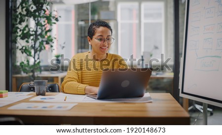 Similar – Image, Stock Photo Diverse colleagues browsing laptop together