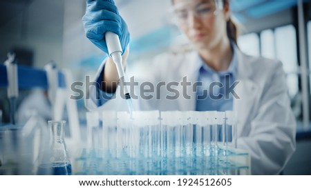 Similar – Image, Stock Photo Doctor testing using the rapid test device for COVID-19