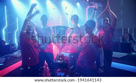 Image, Stock Photo Cheerful boy celebrating victory while playing video game