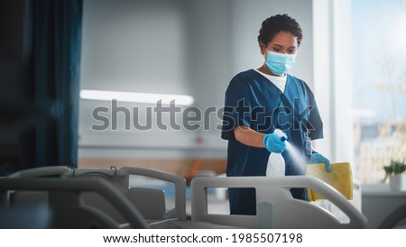 Similar – Image, Stock Photo Worker in mask cleaning machine