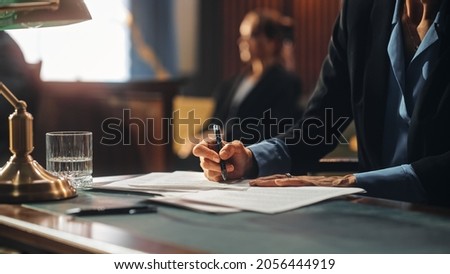 Court of Justice and Law Trial: Female Public Defender Writes Down Arguments for Defence Strategy. Successful Attorney Lawyer Fight for Freedom of Her Client with Supporting Evidence. Close Up. Foto d'archivio © 