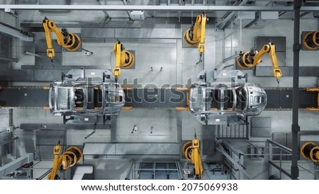 Aerial Car Factory 3D Concept: Automated Robot Arm Assembly Line Manufacturing Advanced High-Tech Green Energy Electric Vehicles. Construction, Building, Welding Industrial Production Conveyor ストックフォト © 