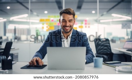 Similar – Image, Stock Photo Diverse colleagues browsing laptop together