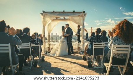 Similar – Image, Stock Photo Newlywed couple kissing during romantic travel