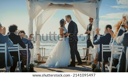Similar – Image, Stock Photo Newlywed couple kissing during romantic travel