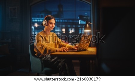 Similar – Image, Stock Photo Stylish young man sitting on concrete wall