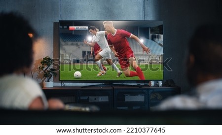 Similar – Image, Stock Photo Black athletic man sitting on lawn and using smartphone