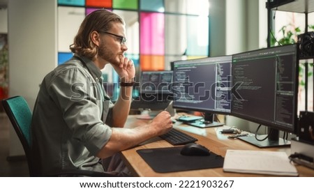 Similar – Image, Stock Photo Male technician programming machine in garage