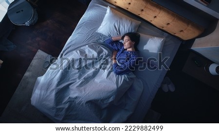 Similar – Image, Stock Photo Young woman lying in bed suffering, tired woman covering face with hands, can’t sleep feels exhaustand on white sheets in bedroom