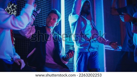 Similar – Image, Stock Photo Young man in neon red illumination