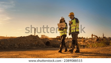 Similar – Image, Stock Photo Architects working material in the foreground, in the background a blurred employee in front of the monitor