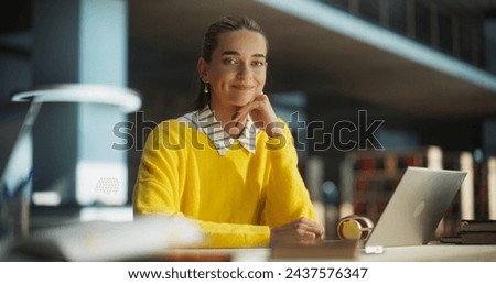 Similar – Image, Stock Photo Young female student in a university library