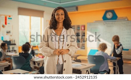 Similar – Image, Stock Photo Portrait of beautiful happy craft woman wearing apron and smiling while standing in her art studio or craft pottery shop